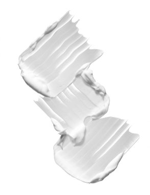 Beyaz smear kozmetik krem beyaz arka plan üzerinde izole. Beyaz arka plan üzerinde izole beyaz kremalı Vakfı doku