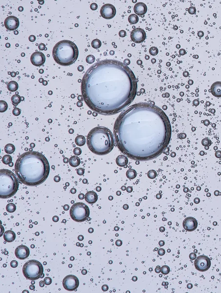 泡とサークル浮動図形に油滴によって形成されるテクスチャの完全なフレーム — ストック写真