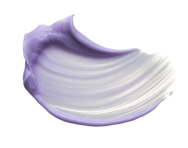 Purple makeup smear of lip gloss isolated on white background. Purple cream texture isolated on white background