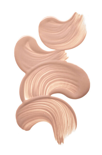 Light beige makeup smear of creamy foundation isolated on white background. Light beige creamy foundation texture background