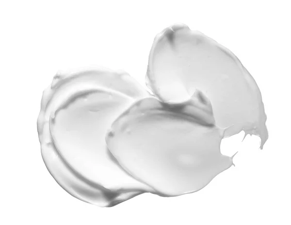 化粧品クリームの白い背景で隔離の白い汚れ 白い背景に分離された白いクリーミィファンデーション テクスチャ — ストック写真