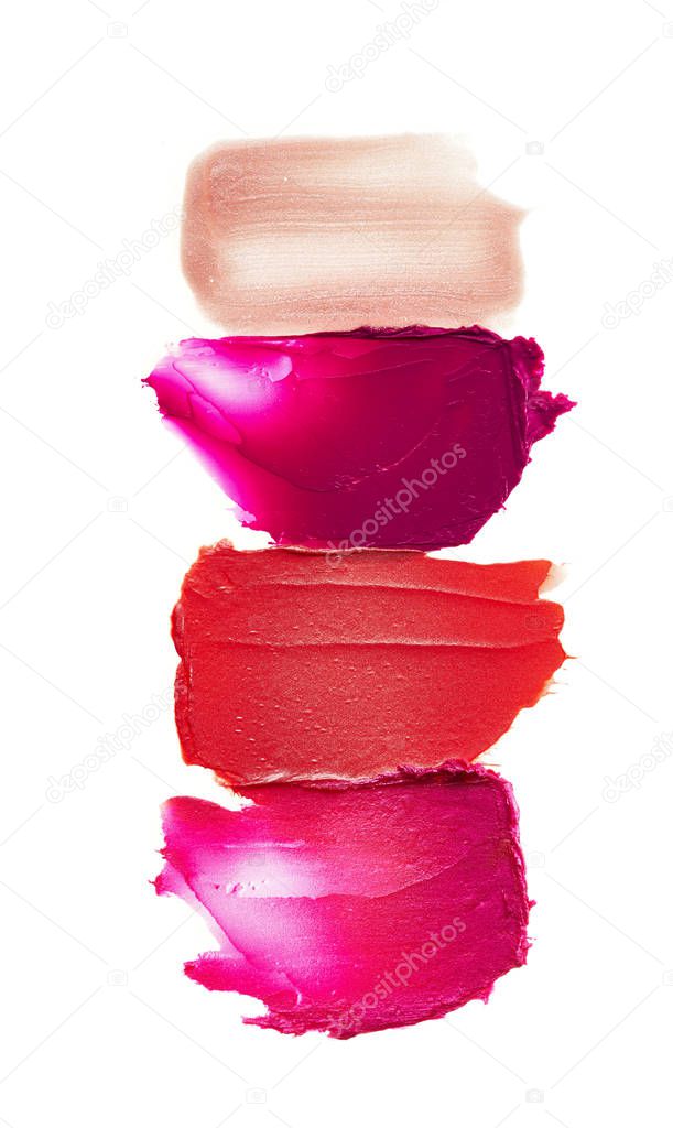 Smears of lipstick on white background, various colors