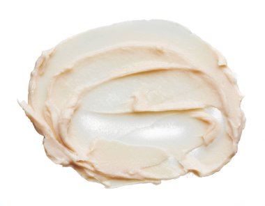 Hafif bej makyaj smear beyaz arka plan üzerinde izole kremsi Vakfı