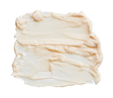 Hafif bej makyaj smear beyaz arka plan üzerinde izole kremsi Vakfı