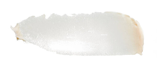 Light beige makeup smear of creamy foundation isolated on white background