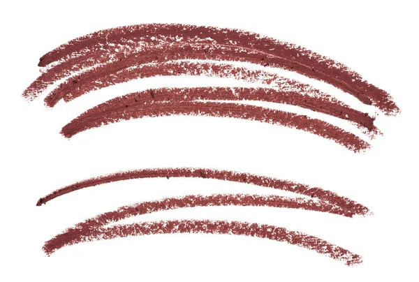 Beyaz karton üzerinde kozmetik kalem tarafından çizilmiş çizgiler