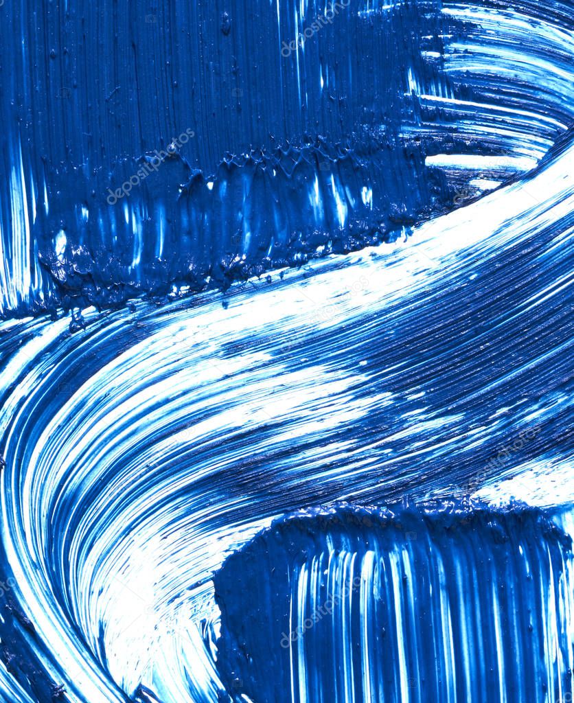 Texture of blue mascara for eyelashes isolated on white background. Smear of navy blue mascara for eyelashes on white background.