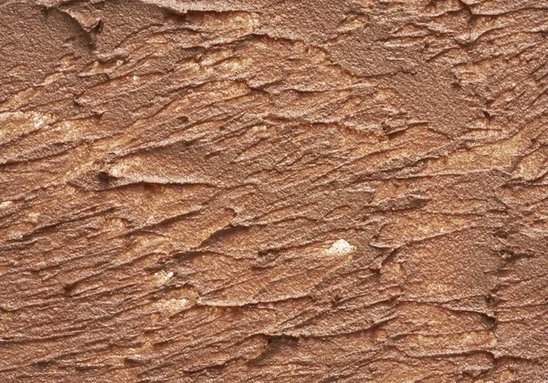 Beige makeup smear of creamy foundation isolated on white background. Beige creamy foundation texture background