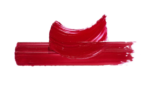 Batom vermelho ou tinta acrílica isolada sobre branco — Fotografia de Stock