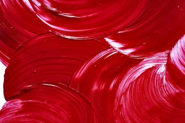 Красная помада или акриловая краска изолированы на белом — стоковое фото