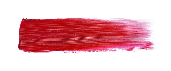 Roter Lippenstift oder Acrylfarbe isoliert auf weiß — Stockfoto