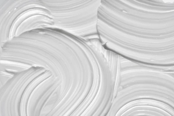 Белый мазок для лица глины или крема — стоковое фото