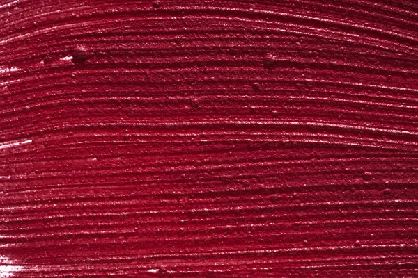 Красная кремовая текстура помады — стоковое фото