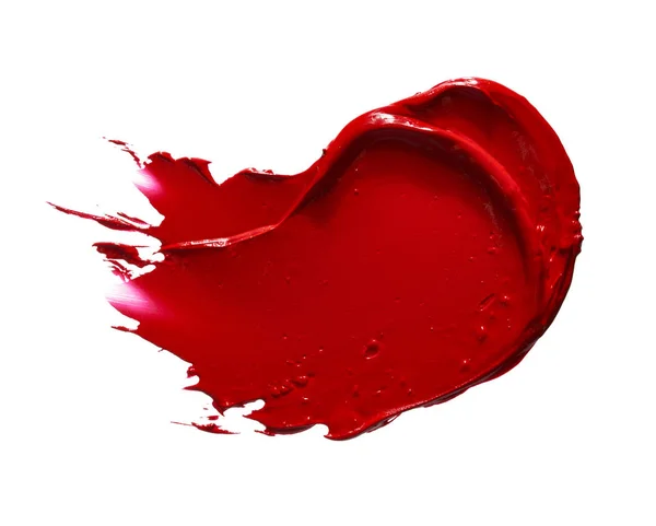 Rött läppstift eller akrylfärg isolerad på vit — Stockfoto