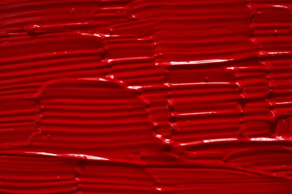 Rouge à lèvres rouge ou peinture acrylique isolé sur blanc — Photo