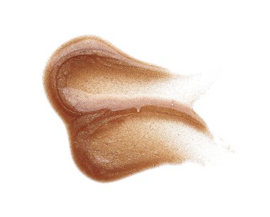 Beyaz arka planda izole edilmiş altın dudak parlatıcısının lekeleri ve dokusu