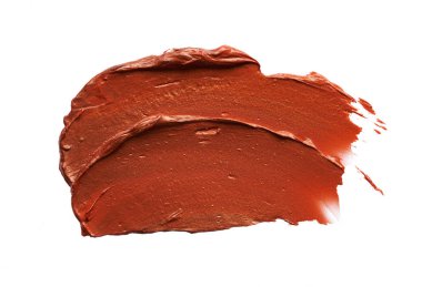 Beyaz arka plan üzerinde izole bronz dudak parlatıcı smear ve doku