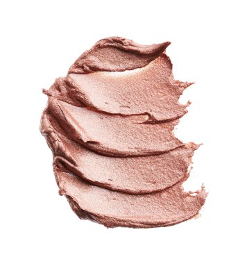 Beyaz arka planda izole edilmiş kapatıcının hafifçe bej darbeleri ve dokusu