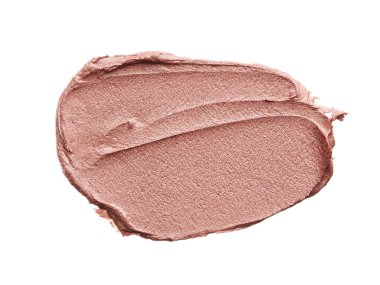 Beyaz arka planda izole edilmiş kapatıcının hafifçe bej darbeleri ve dokusu