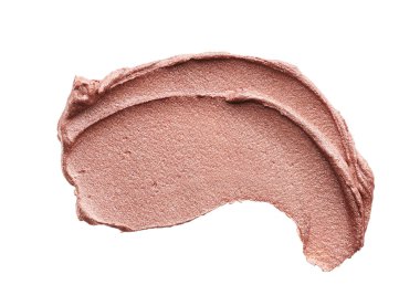 Beyaz arka planda izole edilmiş kapatıcının hafifçe bej darbeleri ve dokusu