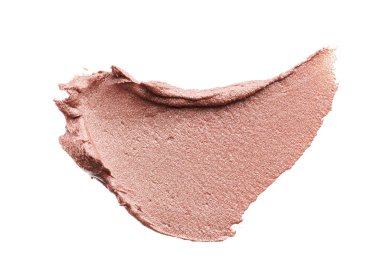 Beyaz arka planda izole edilmiş kapatıcının hafifçe bej darbeleri ve dokusu