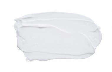 Beyaz smear ve doku yüz kil veya beyaz arka planda izole krem ile yapılan.