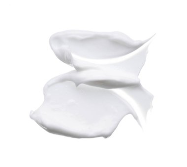 Beyaz smear ve doku yüz kil veya beyaz arka planda izole krem ile yapılan.