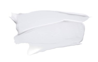 Beyaz smear ve doku yüz kil veya beyaz arka planda izole krem ile yapılan.