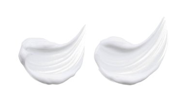 Beyaz smear ve doku yüz kil veya beyaz arka planda izole krem ile yapılan.