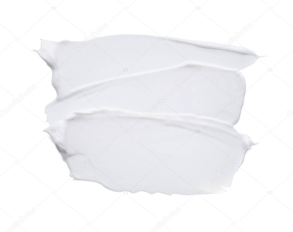 White smear and texture made with face clay or cream isolated on white background.