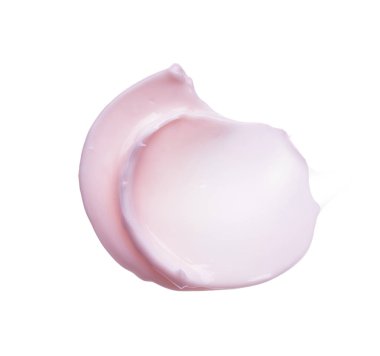 Hafifçe pembe darbeler ve yüz kremi veya beyaz arka plan üzerinde izole akrilik boya doku