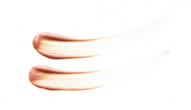 Beyaz arka planda izole edilmiş yüz vurgulayıcı veya akrilik boya yavaşça bej vuruşları ve dokusu