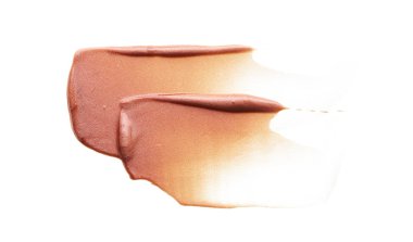 Beyaz arka planda izole edilmiş yüz vurgulayıcı veya akrilik boya yavaşça bej vuruşları ve dokusu