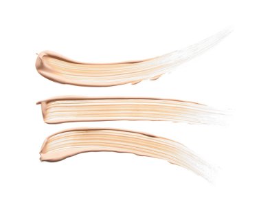 Beyaz arka planda izole edilmiş yüz vurgulayıcı veya akrilik boya yavaşça bej vuruşları ve dokusu