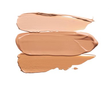 Beyaz arka planda izole edilmiş yüz vurgulayıcı veya akrilik boya yavaşça bej vuruşları ve dokusu