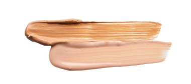 Beyaz arka planda izole edilmiş yüz vurgulayıcı veya akrilik boya yavaşça bej vuruşları ve dokusu