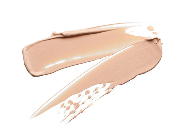 Нежно бежевые штрихи и текстура лица выделитель или акриловая краска изолированы на белом фоне
