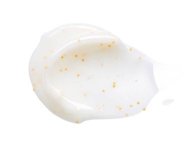 Beyaz arka planda sarı bezelye ile beyaz yüz kremi smear ve doku