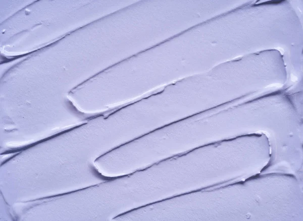 Delikatnie Fioletowe Pociągnięcia Tekstura Kremu Twarzy Lub Farby Akrylowej Białym — Zdjęcie stockowe