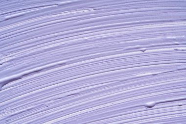 Hafifçe mor vuruş ve yüz krem veya beyaz arka planda izole akrilik boya dokusu