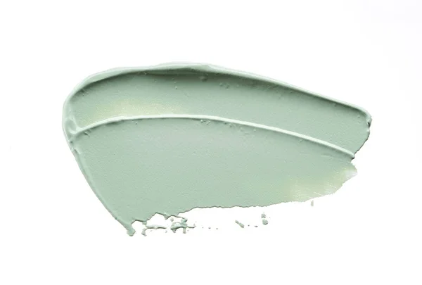 Delikatnie Zielone Pociągnięcia Tekstura Kremu Twarzy Lub Farby Akrylowej Białym — Zdjęcie stockowe