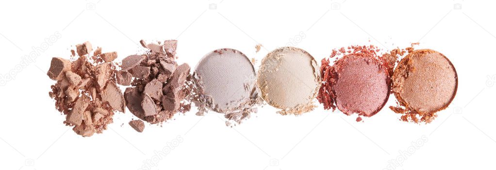 Broken eyeshadows in trendy shades isolated on white background