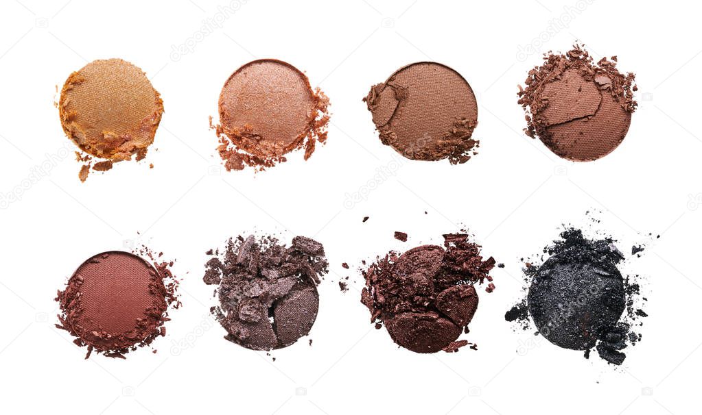 Broken eyeshadows in trendy shades isolated on white background