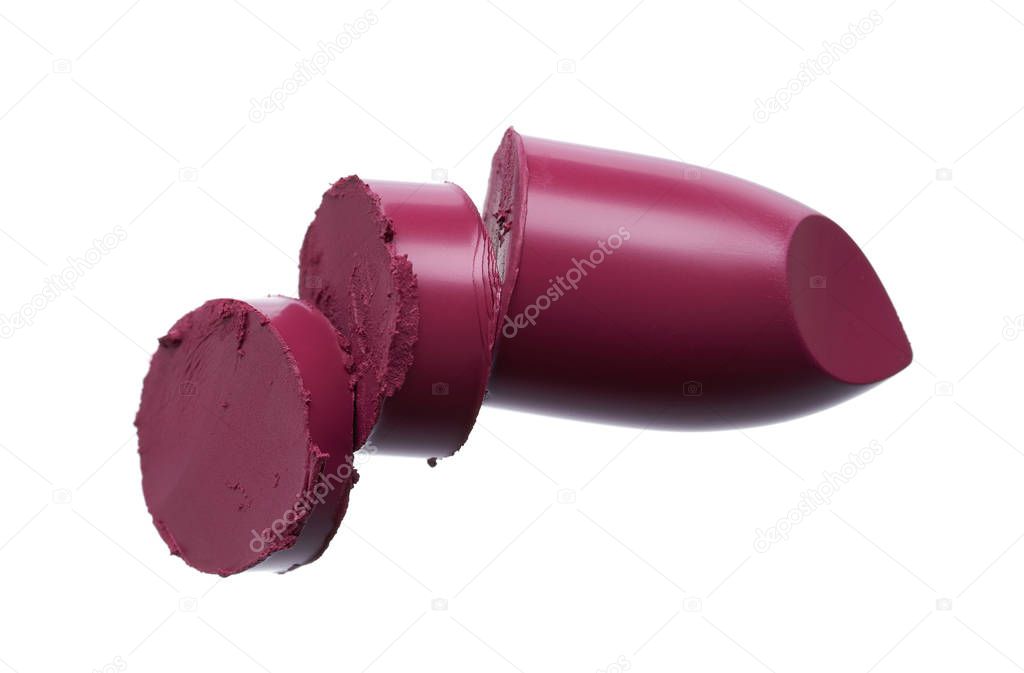 Smears and texture of  burgundy color lipstick or acrylic paint on a white background