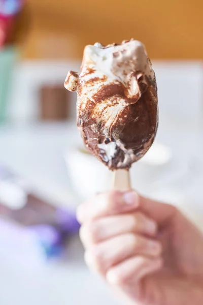 Milkshake with chocolate topping in a glass cocktail bowl, decorated with marshmallows