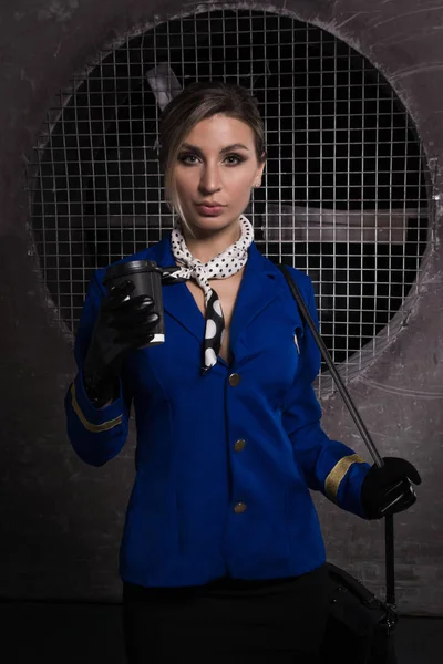 Young beautiful flight attendant in uniform. Not contain any logos or trademark