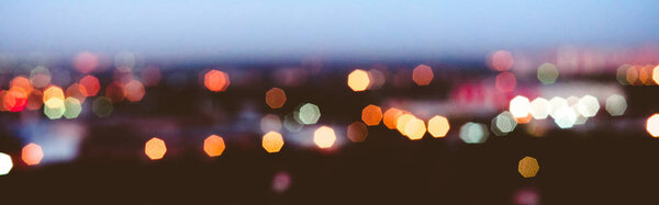 City lights blur bokeh. Evening background