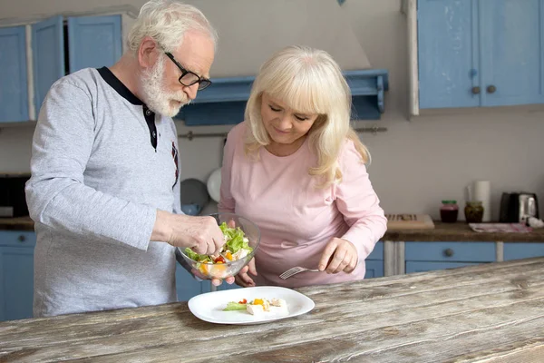 Senior couple cooking together. — Stock Photo, Image