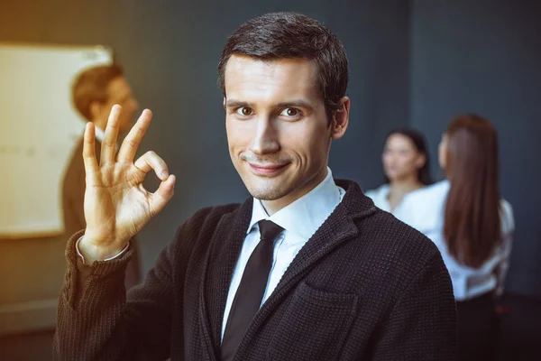 Smartly dressed businessman in office — Stock Photo, Image