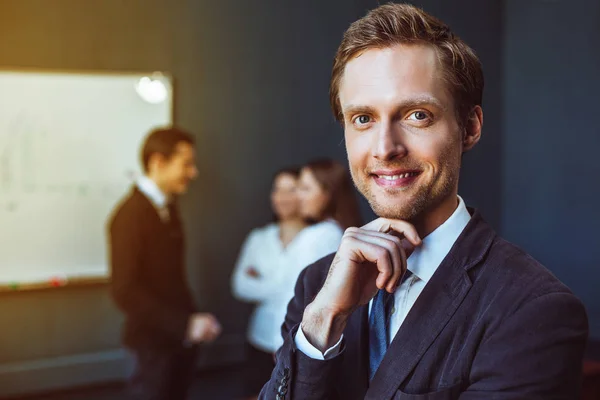 Smartly dressed businessman in office — Stock Photo, Image